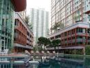 Modern apartment complex exterior with pool