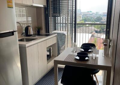 Modern kitchen and dining area with large window