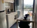 Modern kitchen and dining area with large window