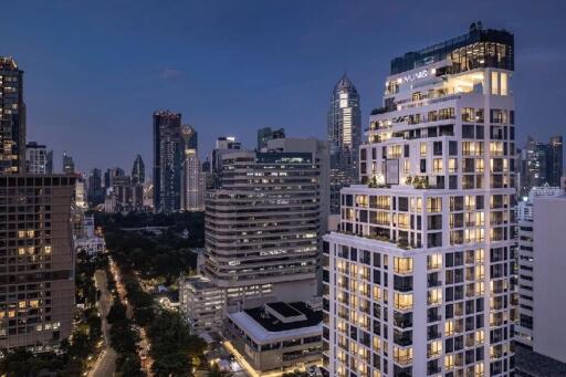 night view of city skyline with illuminated buildings