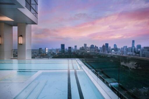 Rooftop pool with city skyline view