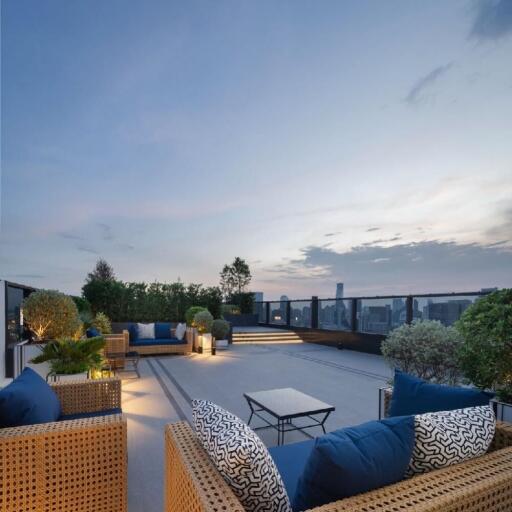 Modern rooftop terrace with city view