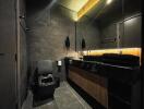 Modern bathroom with dark tiles and wooden details