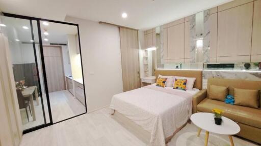 Modern bedroom with attached kitchenette