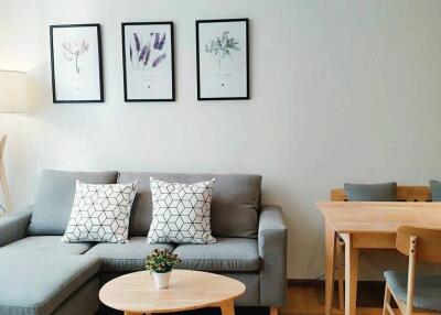 Modern living room with sofa and dining area