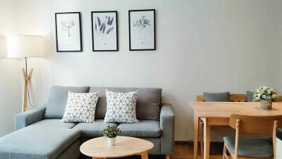 Modern living room with sofa and dining area