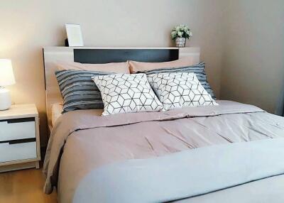 Modern bedroom with double bed and nightstand