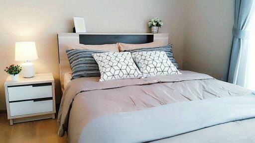 Modern bedroom with double bed and nightstand