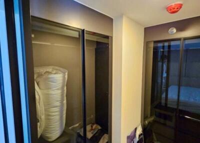 Closet area in a bedroom with wardrobe storage