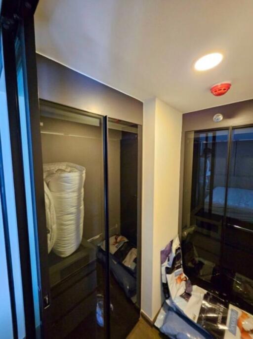 Closet area in a bedroom with wardrobe storage