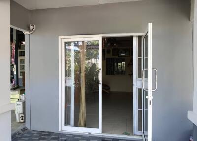 front entryway with glass sliding door