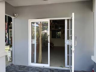 front entryway with glass sliding door