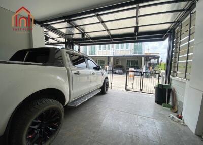 garage with car parked inside