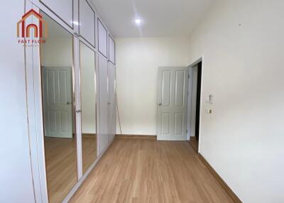 Bedroom with large built-in wardrobe