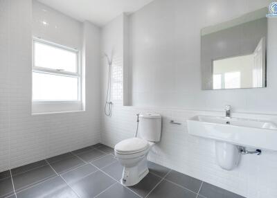 Modern minimalist bathroom with large window