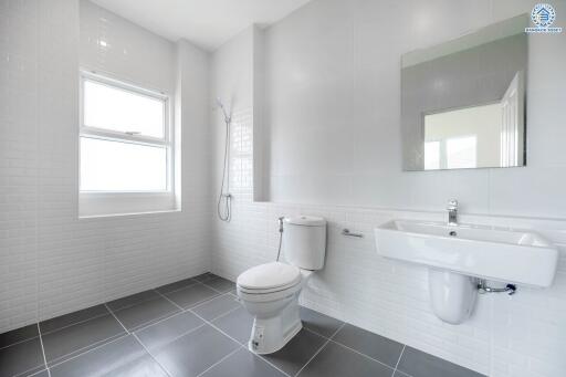 Modern minimalist bathroom with large window