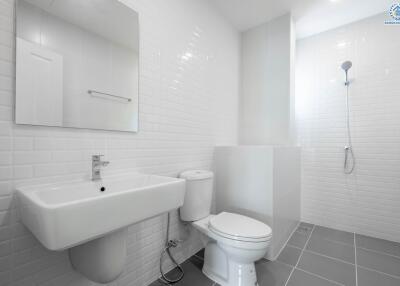 Bright and modern bathroom with white tiles