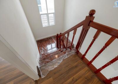 Wooden staircase with handrail