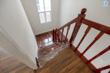 Wooden staircase with handrail