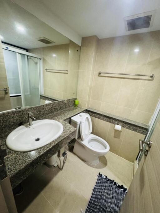 Modern bathroom with granite countertop