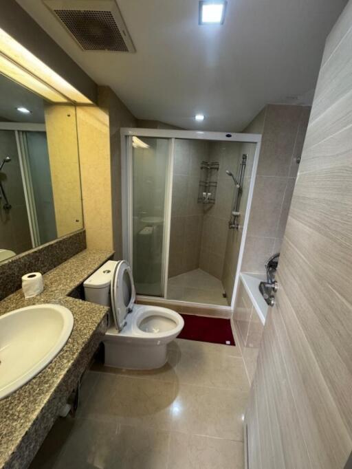 Modern bathroom with glass shower and toilet