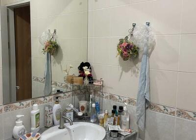 Bathroom with sink and toiletries