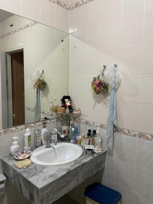 Bathroom with sink and toiletries