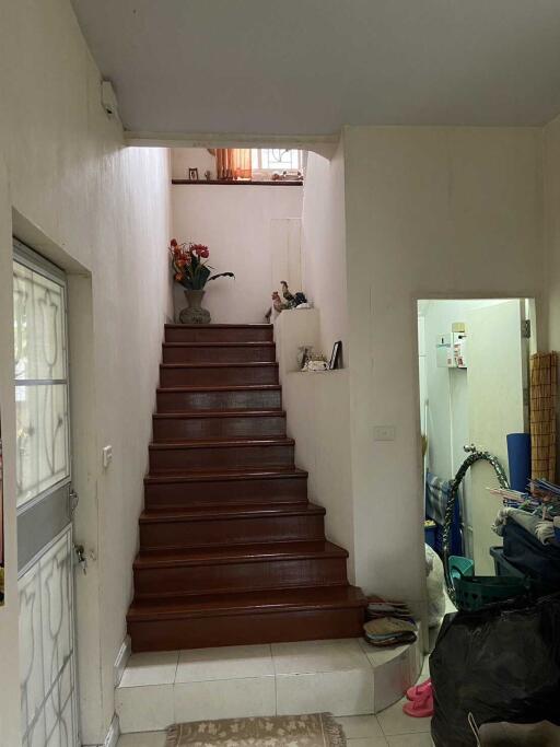 Interior staircase leading to an upper floor