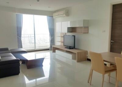 Spacious living room with modern furniture and natural light