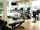 Modern fitness center with various exercise equipment