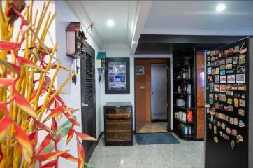 Modern kitchen with refrigerator and storage spaces