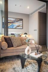 Modern living room with beige sofa and decorative elements