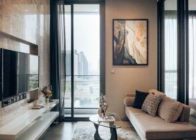 Modern living room with large window and city view