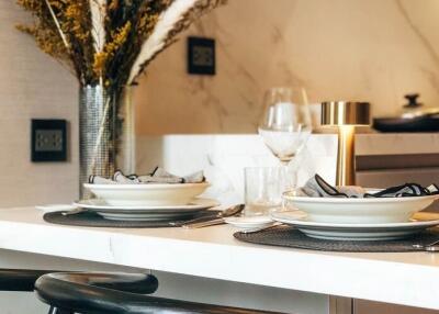 Modern kitchen dining area with elegant table setting