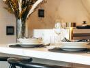 Modern kitchen dining area with elegant table setting