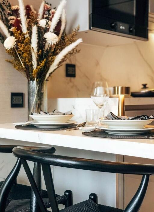 Modern kitchen dining area with elegant table setting