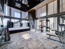 Spacious gym with boxing ring and exercise equipment