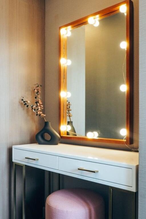 Bedroom vanity with mirror and lights