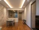 Modern dining area with table and chairs