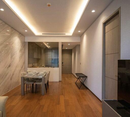 Modern dining area with table and chairs