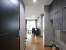 Modern hallway leading to a dining area