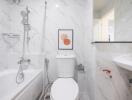 Modern bathroom with white marble walls and fixtures