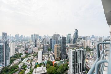 Scenic city skyline view from a high-rise balcony