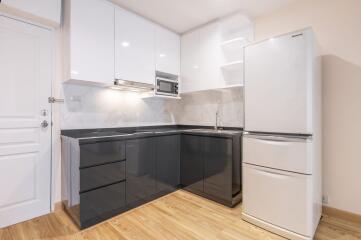 Modern kitchen with white and grey cabinetry