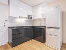 Modern kitchen with white and grey cabinetry