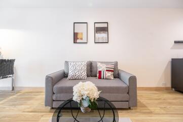 Modern living room with sofa and decor