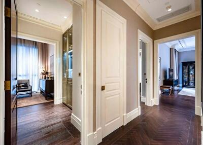 Elegant hallway with view into adjacent rooms