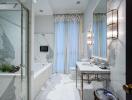 Modern elegant bathroom with bathtub and marble finishes