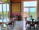 Spacious dining room with wooden ceiling and marble floor