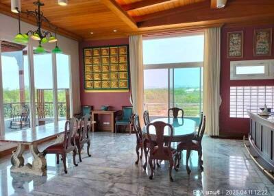 Spacious dining area with large windows and beautiful view